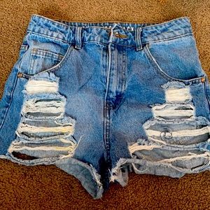 UO The Flashback High Rise Destroyed Cheeky Shorts